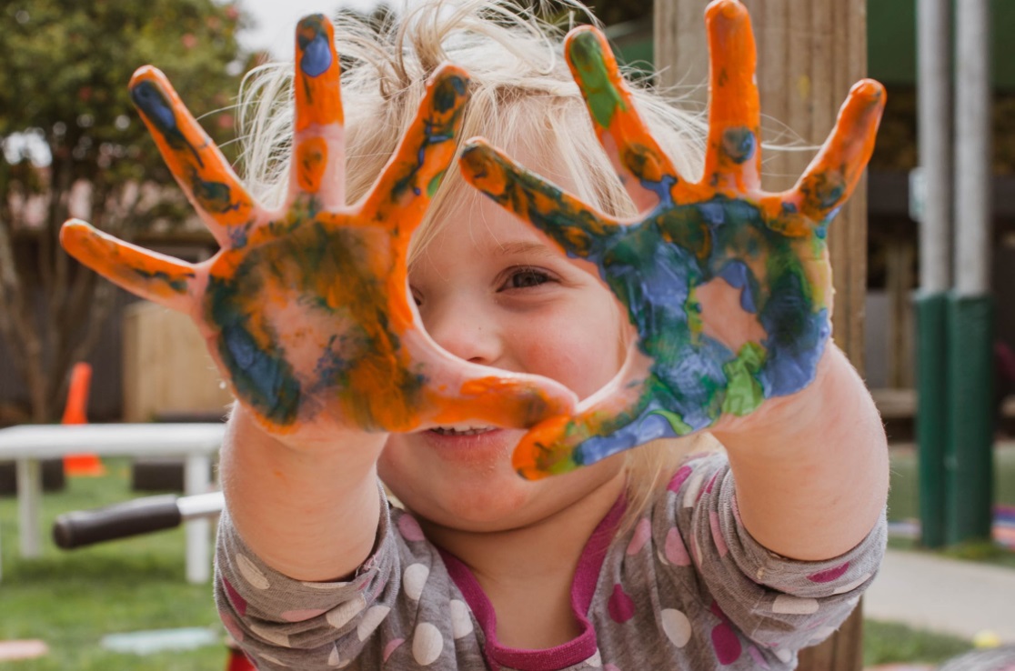 Child with painted hands